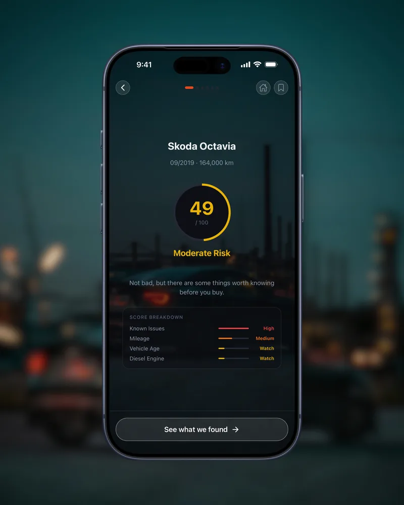 The Carlyze app showing a used Škoda Octavia scored 49 out of 100 — Moderate Risk — with a score breakdown below it.