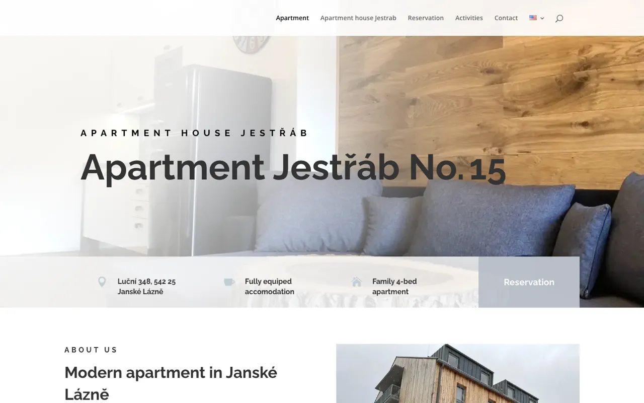 The original Divi-built homepage in English: grey type, a flat inline fact bar, the same hero photo.